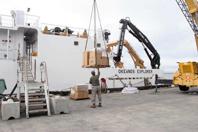 Loading stores aboard a ship.